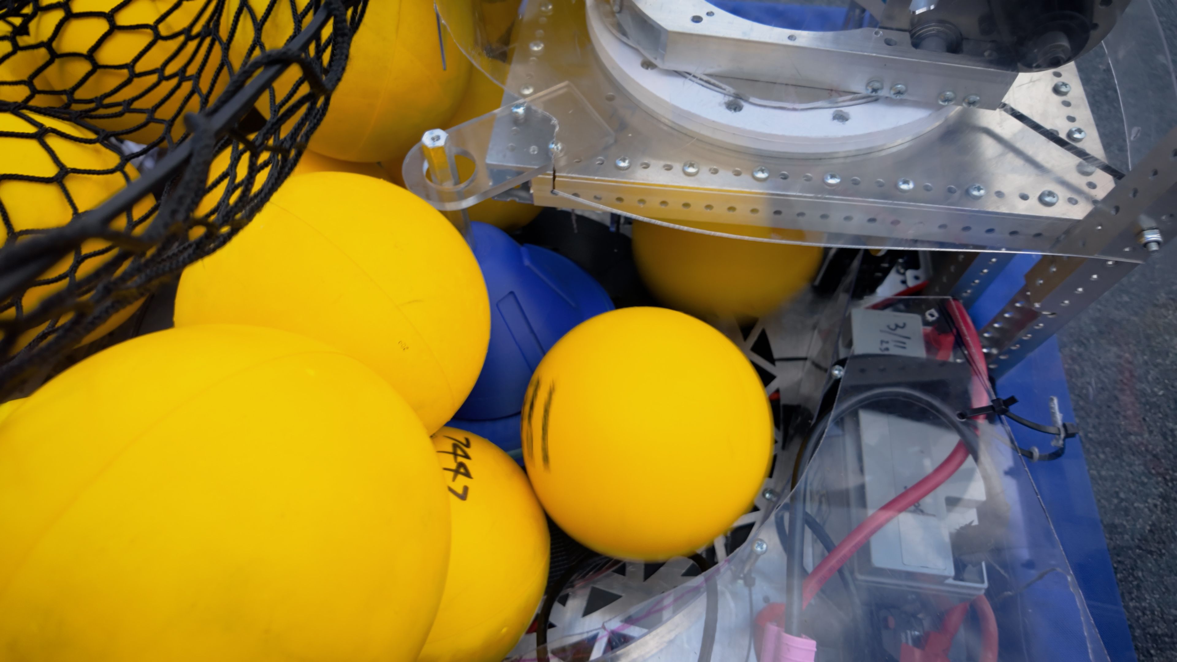 Close-up of the robot packed with yellow game pieces during the 2026 season.